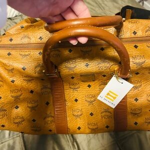 MCM Travel Duffel bag 21x11, purchased from @brandauthentic.Beautiful bag.